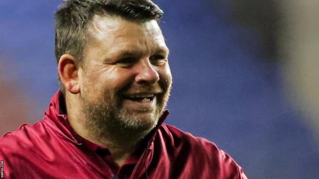 Lee Briers smiles during a coaching session
