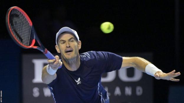 Andy Murray stretches for a return against Tomas Martin Etcheverry