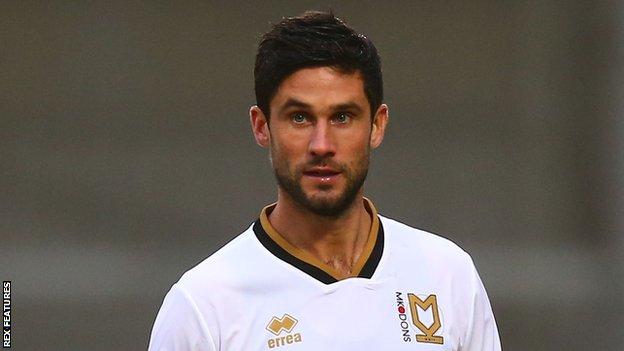 Andrew Surman in action for MK Dons