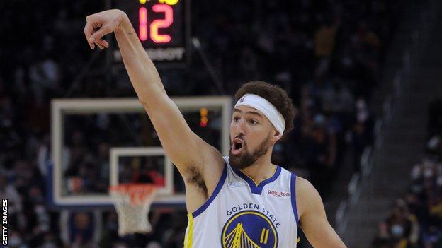 Klay Thompson reacts after hitting a shot for the Golden State Warriors