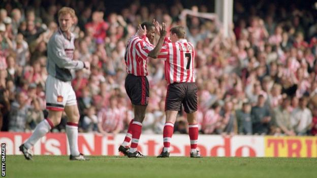 Southampton's players celebrate scoring against Manchester United in 1996
