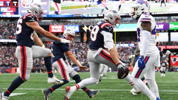 Mike Gesicki celebrates his late winning touchdown for the New England Patriots