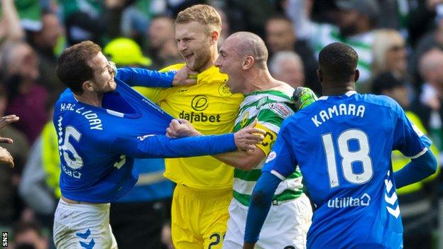 Andy Halliday and Scott Brown tussle