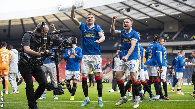 Borna Barisic and Scott Arfield celebrate during a Scottish Cup Semi-Final between Celtic and Rangers at Hampden Park