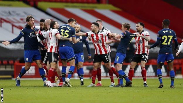Sheffield United and Southampton players clash