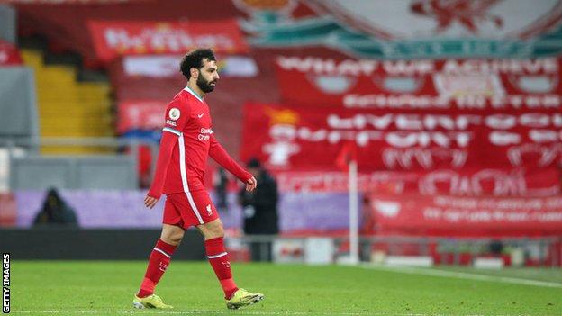 Mohamed Salah walks off the pitch against Chelsea