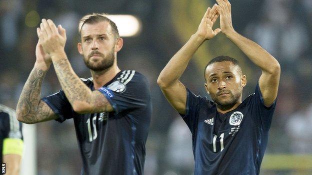Scotland pair Steven Fletcher (left) and Ikechi Anya are out of Celtic's price range, says assistant John Collins