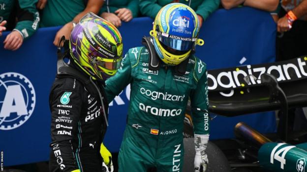 Lewis Hamilton and Fernando Alonso congratulate each other at the end of the 2023 Canadian Grand Prix