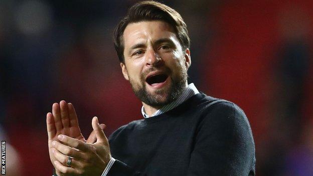 Russell Martin celebrates Swansea's victory