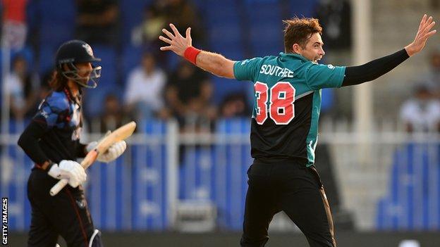 New Zealand bowler Tim Southee (right) successfully appeal for lbw against Namibia batter David Wiese (left)