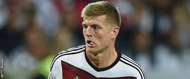 Toni Kroos of Germany in action against Poland