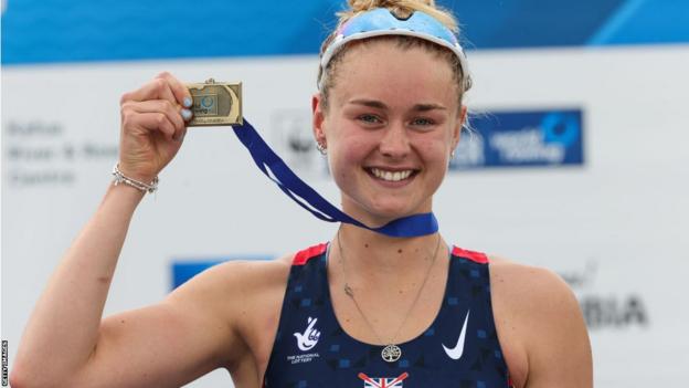 Hannah Scott on the podium during the 2022 World Rowing Cup in Belgrade
