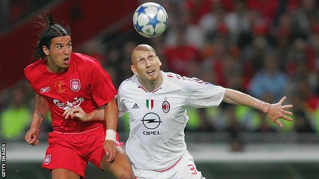 Milan Baros contests for a header with Jaap Stam in the 2005 Champions League final