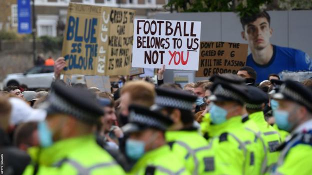 Fans protest outside of Stamford Bridge