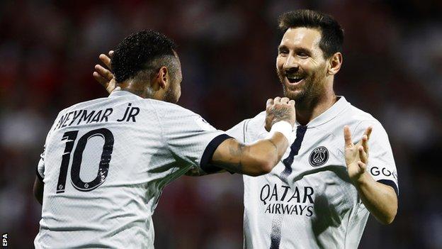 Neymar and Lionel Messi celebrate a PSG goal at Clermont
