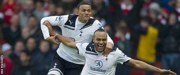 Jermaine Jenas celebrates with Younes Kaboul after his winner against Arsenal in 2010