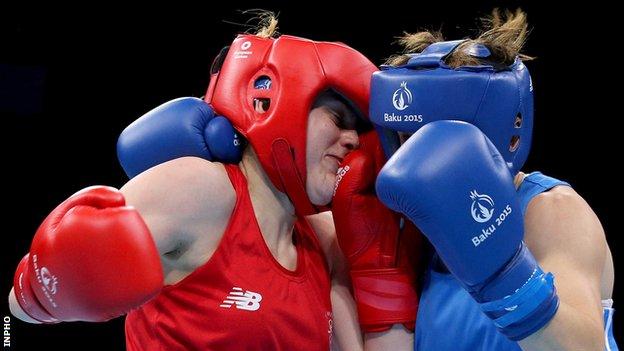 Michaela Walsh trades blows with Russia's Elena Saveleva in Saturday's bout