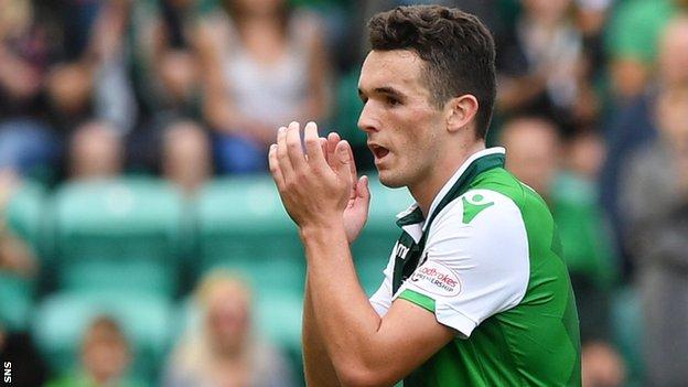John McGinn applauds Hibs fans after being substituted against Motherwell on Sunday