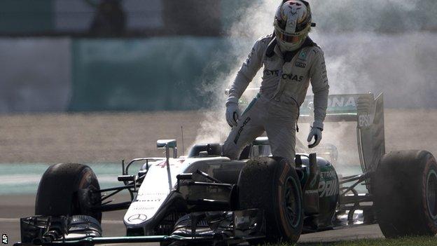 Lewis Hamilton steps out of his Mercedes