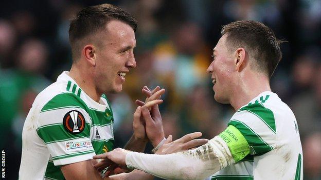 David Turnbull and Callum McGregor embrace