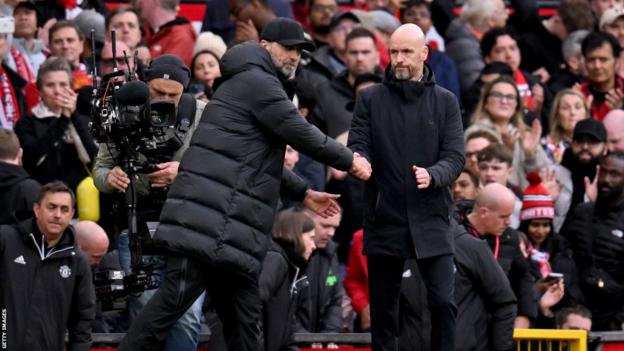 Liverpool manager Jurgen Klopp shakes hands with Manchester United boss Erik ten Hag