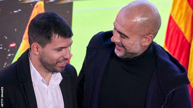 Pep Guardiola speaks to Sergio Aguero