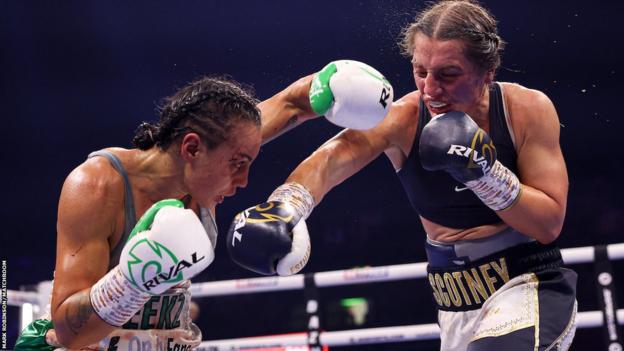 Ellie Scotney throws a punch astatine  Cherneka Johnson