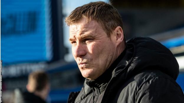 David Flitcroft's last job before being appointed at Vale was as Bolton Wanderers assistant manager