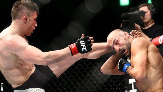 Norman Parke connects with Reza Madadi in their Dublin fight