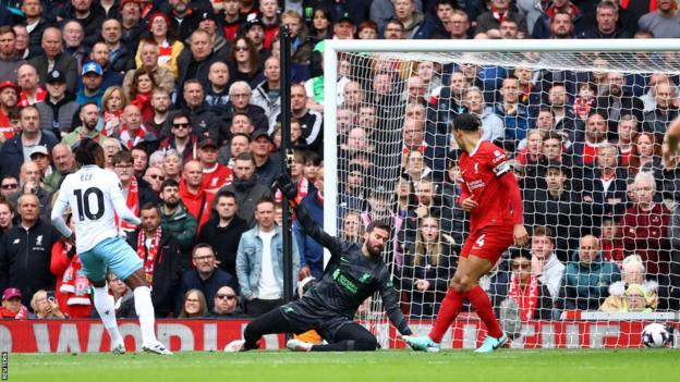 Crystal Palace's Eberechi Eze scores against Liverpool at Anfield in the Premier League