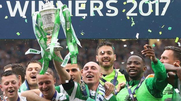 Celtic captain Scott Brown (centre) lifts the Scottish Cup