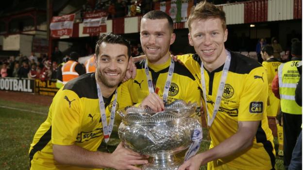 Cliftonville goalscorers David McDaid, Martin Donnelly and Stephen Garrett pictured with the cup after the game