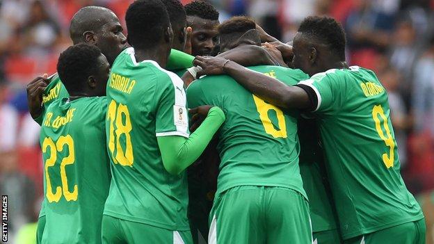 Senegal's players celebrate a goal