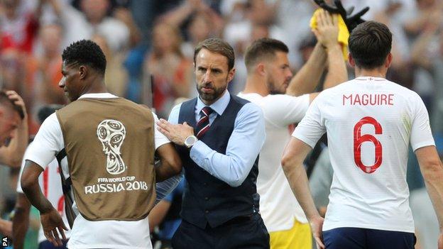 Gareth Southgate (centre), Marcus Rashford (left) and Harry Maguire (right)