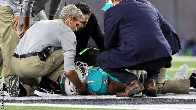 Medical staff tend to Tagovailoa during last Thursday's game between the Miami Dolphins and the Cincinnati Bengals