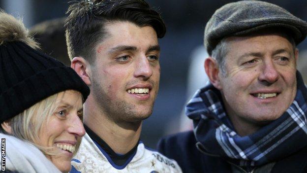 Adam Hastings is flanked by mother Diane (left) and father Gavin (right) after his debut for Bath at Worcester