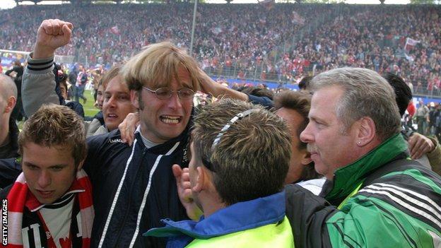 Klopp is mobbed by Mainz fans celebrating their 2004 promotion