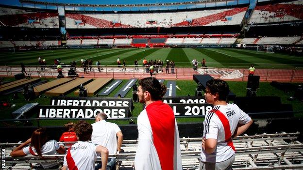 Fans inside the Monumental stadium