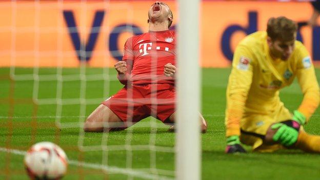 Thiago Alcantara celebrates scoring for Bayern Munich