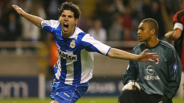 Deportivo La Coruna's Albert Luque celebrates as AC Milan keeper Dida watches on