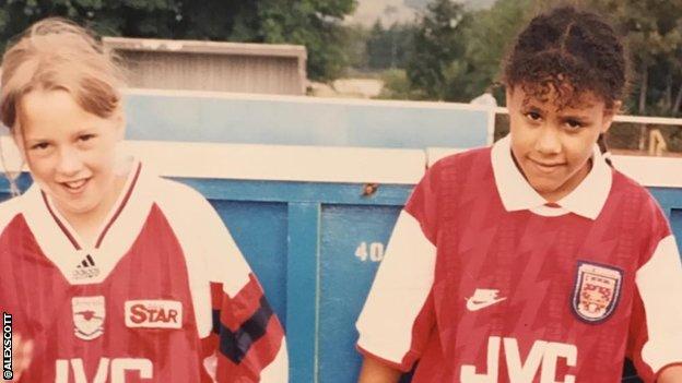 A young Alex Scott wearing Arsenal kit