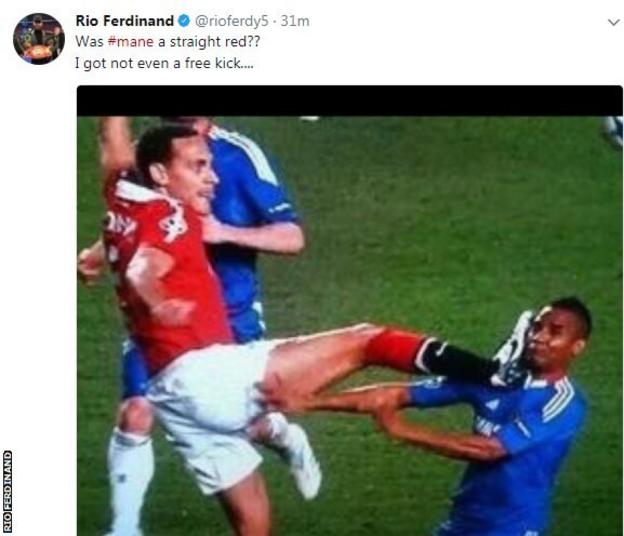 Rio Ferdinand kicks a player