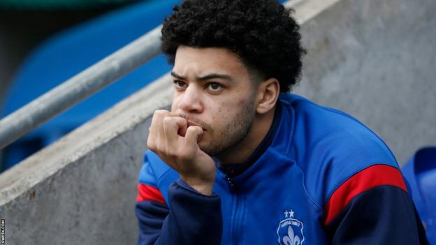 Lewis Murphy sits pensive on the Wakefield bench, out for the season and unable to contribute