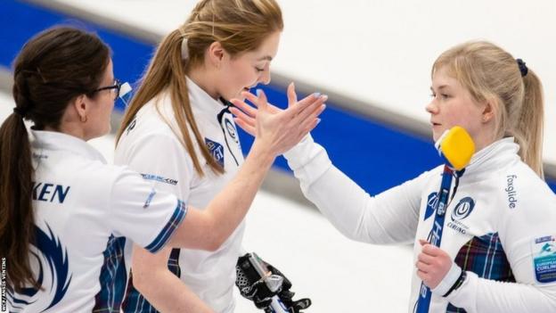 Rebecca Morrison (centre) and her team celebrate