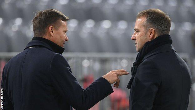 Jesse Marsch (left) speaks to Bayern Munich head coach Hansi Flick as RB Salzburg played the reigning European champions in November 2020
