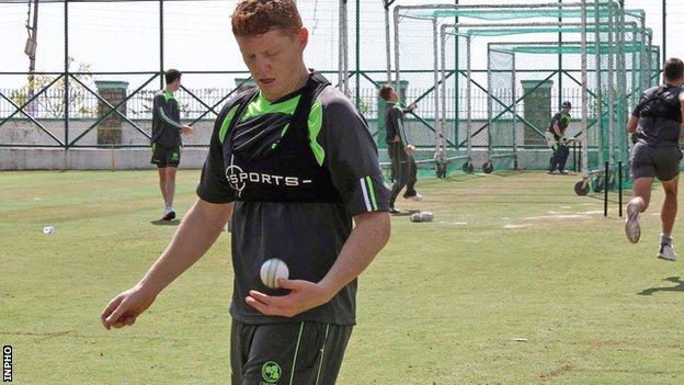 Kevin O'Brien prepares to bowl in the nets ahead of Wednesday's clash against Oman in Dharamasala