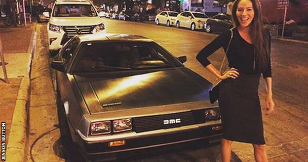 Jenson Button's wife with a DeLorean