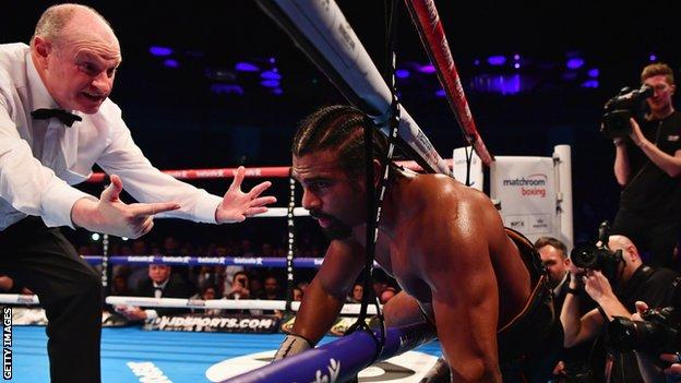 David Haye falls through the ropes during his Heavyweight contest against Tony Bellew at The O2 Arena on March 4, 2017
