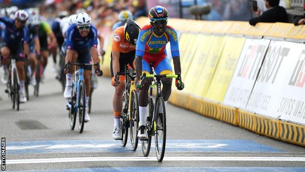 Eritrean cyclist Biniam Girmay crossing the line to win silver in the under-23 men's race at cycling's 2021 Road World Championships