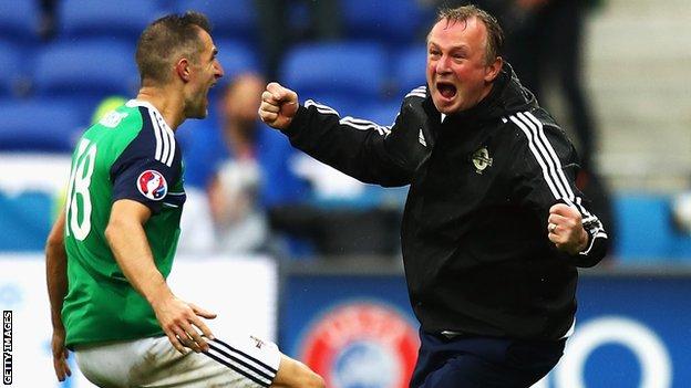 Aaron Hughes and Michael O'Neill celebrate after Niall McGinn's goal in Northern Ireland's 2-0 win over Ukraine at Euro 2016